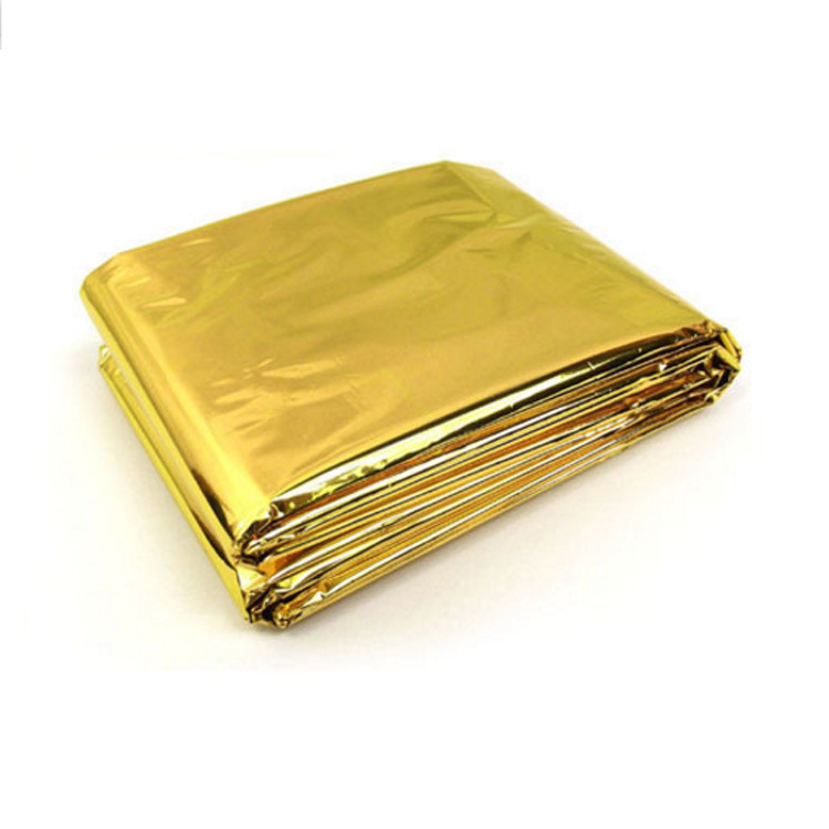 Human Body Hypothermia Lifesaving Emergency Blanket In Outdoor Field - Image 2