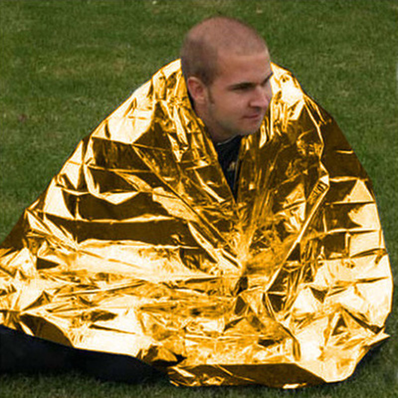 Human Body Hypothermia Lifesaving Emergency Blanket In Outdoor Field - Image 4