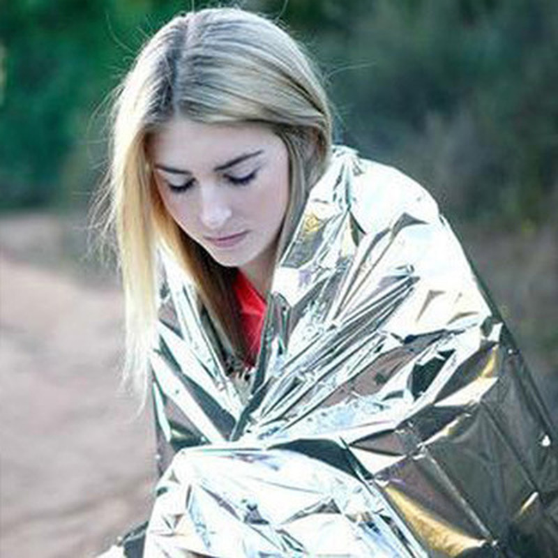 Human Body Hypothermia Lifesaving Emergency Blanket In Outdoor Field - Image 8
